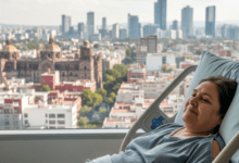 A fat patient rests comfortably in a hospital bed with a view of the Mexico City skyline after gastric sleeve in Mexico.